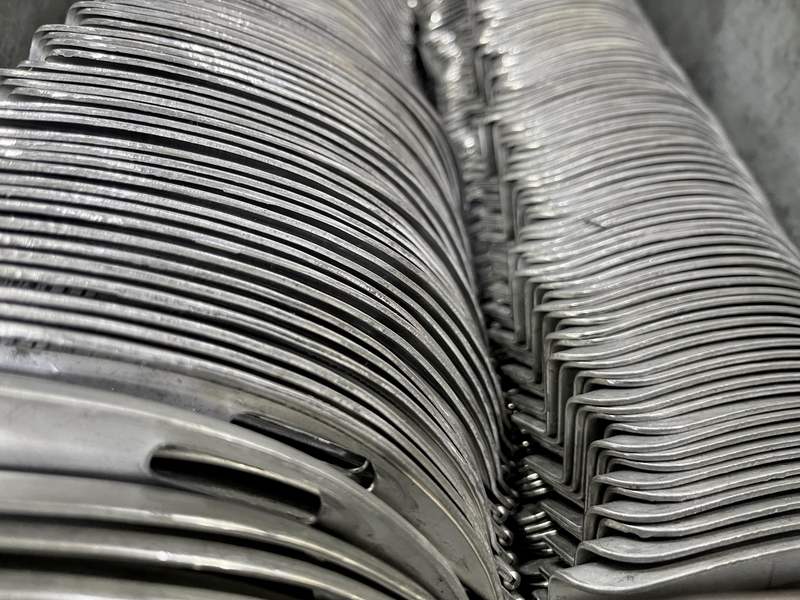 Stacks of formed AISI 304 stainless steel laryngoscope blade blanks